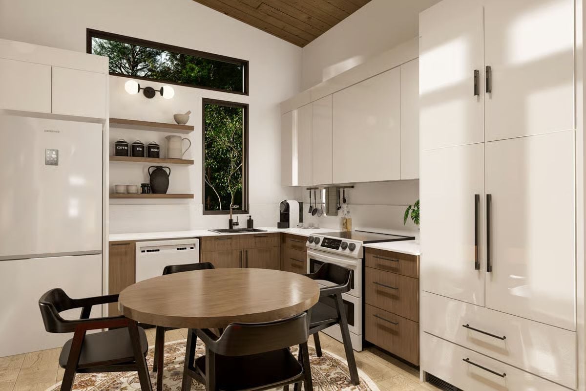 Glossy White Uppers, Warm Wood Lowers, and a Round Table That Softens the Whole Room