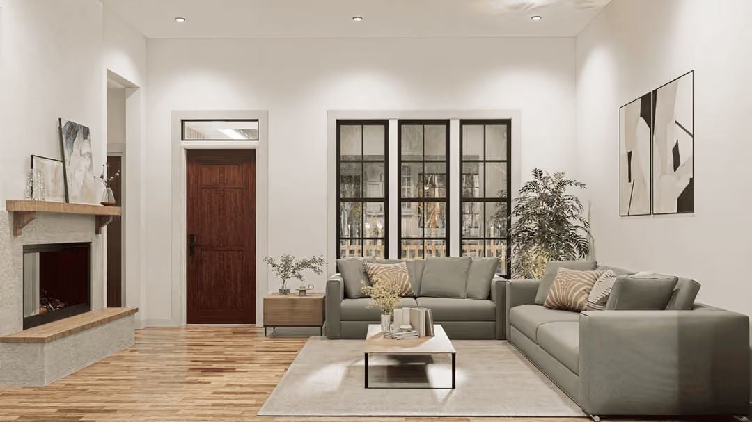 Sage Sofas and a Wood Door That Earns Its Place in the Room