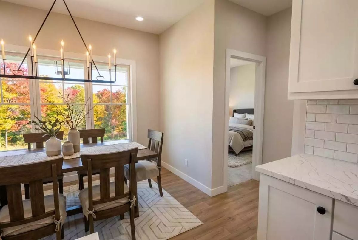 Candlelight Chandelier, Fall Colors Through Glass, and a Dining Room That Earns Its Keep