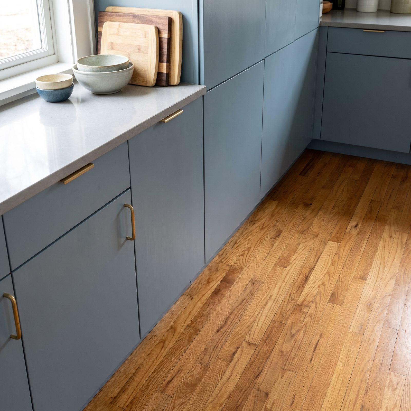 Cool White Cabinets Clashing With Honey Oak Floors