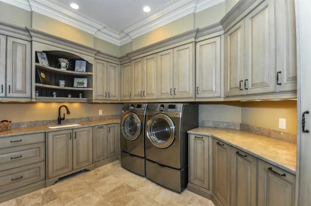 Glazed Cabinetry, Pedestal Appliances, and a Laundry Room Built Like It Means It