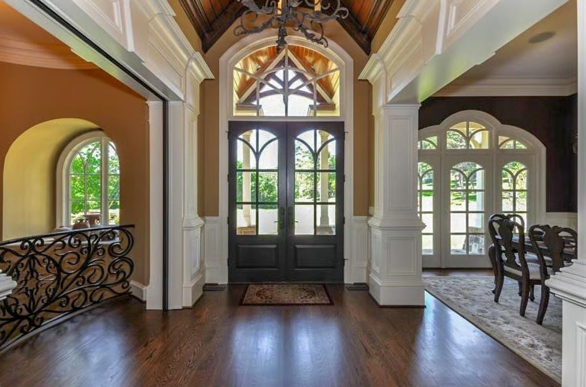 Wrought Iron, Cathedral Arches, and a Front Door Worth the Drive