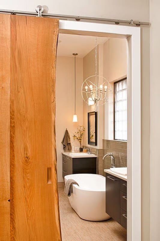 Live-Edge Barn Door Opens Into a Bathroom That Knows Exactly What It Is