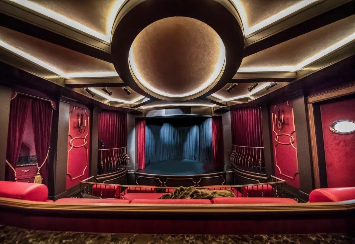 Crimson Velvet, Ornate Railings, and a Screen Room Built Like a Private Box Seat