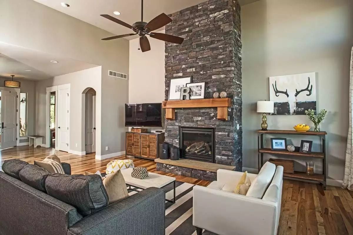 Stacked Stone Fireplace That Earns Every Inch of That Ceiling Height