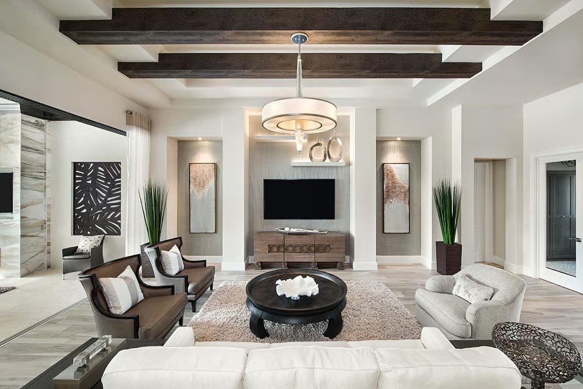 Dark Beams, Round Table, and a TV Wall That Actually Works