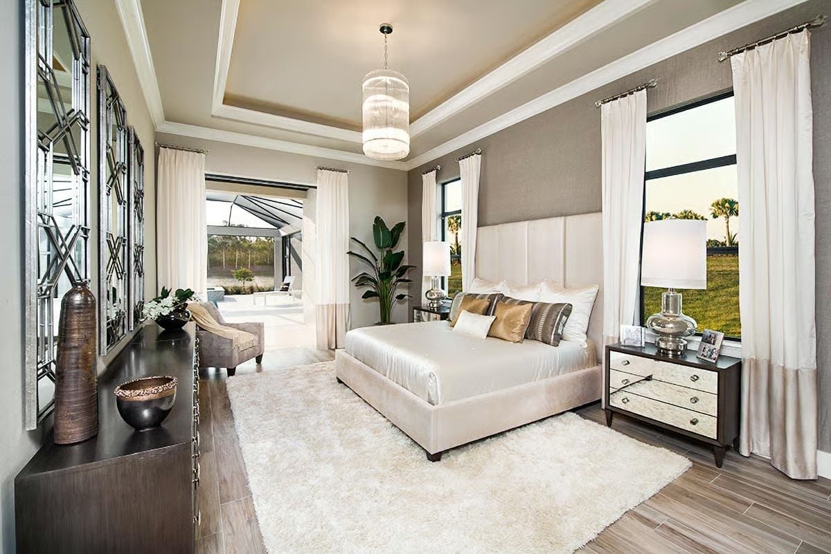 Tray Ceiling, Crystal Pendant, and a Headboard Tall Enough to Mean It