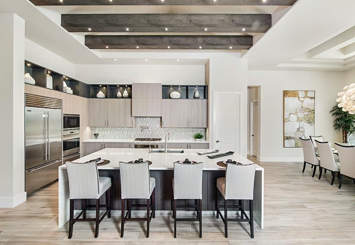 Waterfall Island, Dark Beams, and Barstools That Mean Business