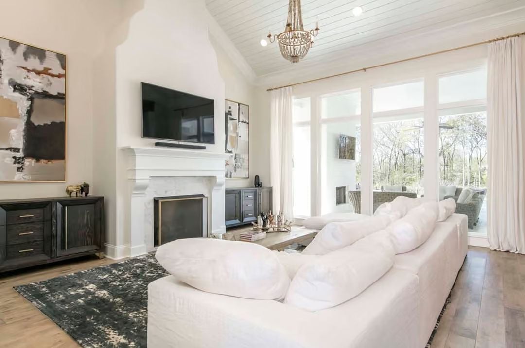 Beaded Chandelier, Cathedral Ceiling, and a Sofa You Won't Want to Leave