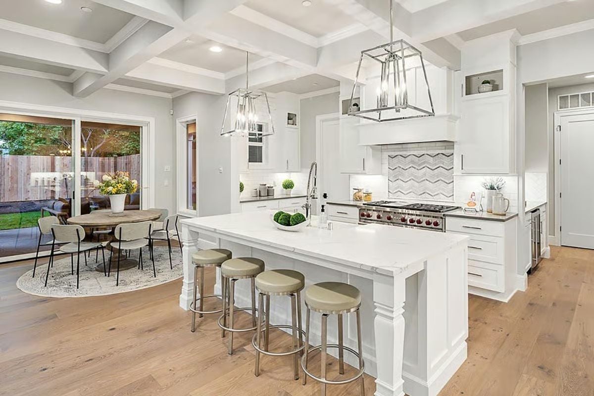 Coffered Beams, a Pro Range, and Four Stools That Mean Business
