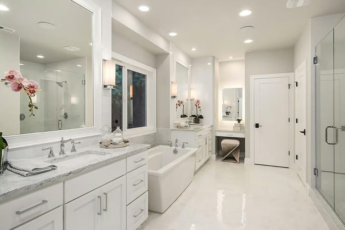 Marble Counters, Orchids, and a Soaking Tub That Holds the Center