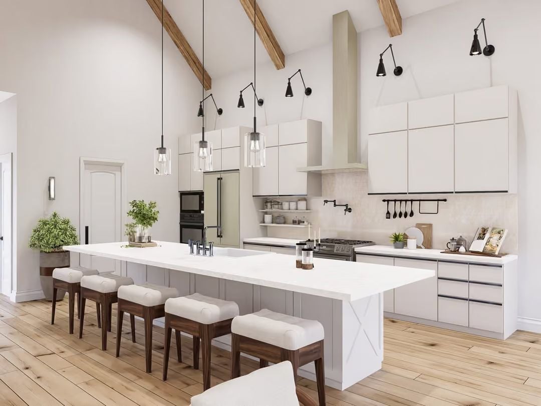 Vaulted White Kitchen Where the Island Does Most of the Work