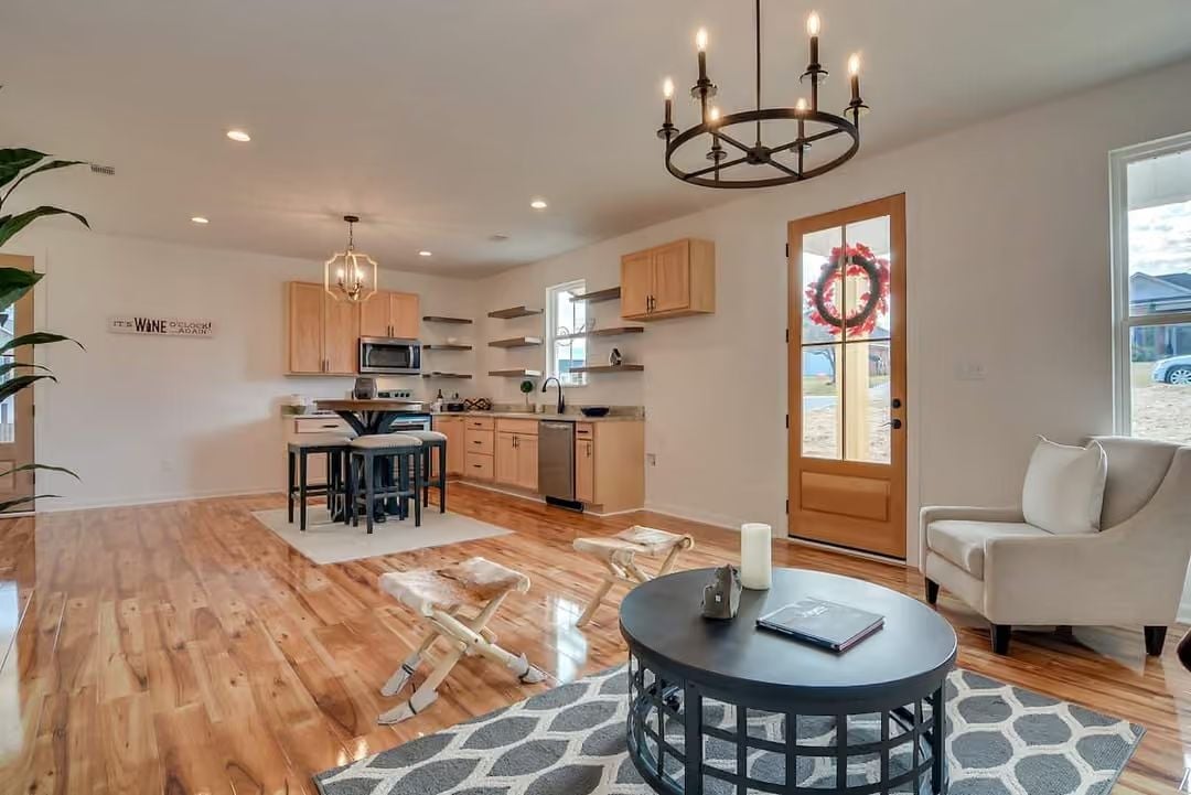 Candle-Ring Chandelier Anchors an Open Plan That Actually Flows