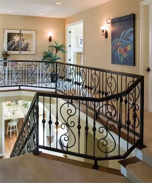 Wrought Iron Balustrade on a Staircase That Doesn't Need Much Else