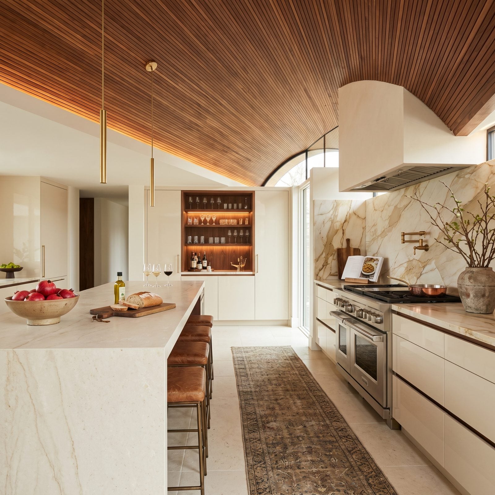 Cream Cabinets Beneath a Walnut Barrel Vault