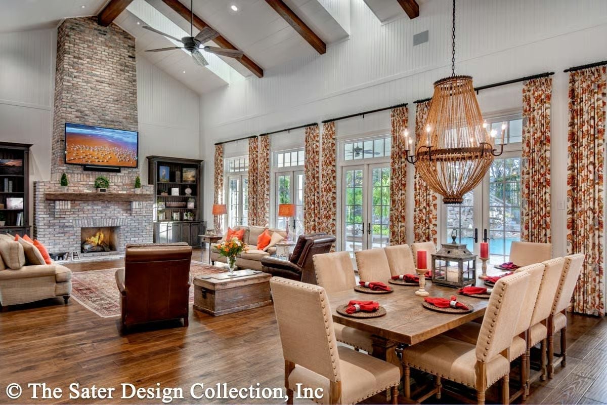 Brick Fireplace Tower, Rattan Pendant, and a Dining Table That Seats Everyone