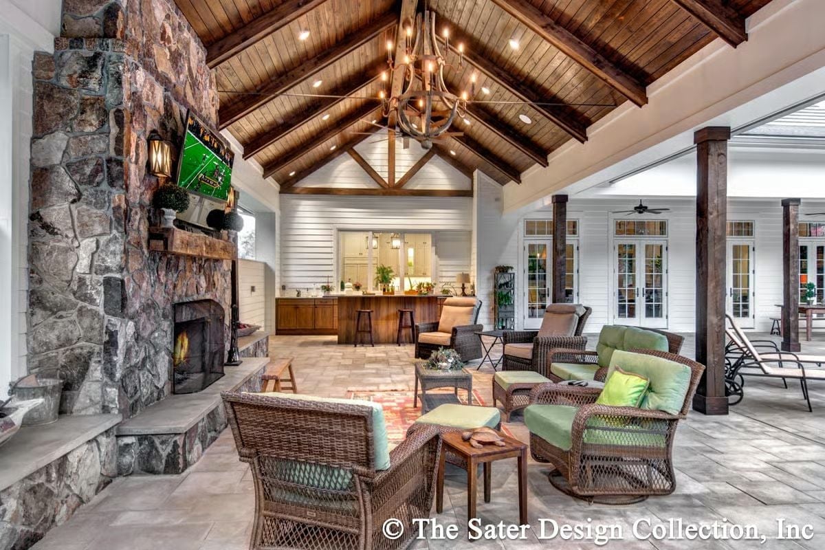 Stone Fireplace, Antler Chandelier, and an Outdoor Room That Doesn't Apologize for Itself
