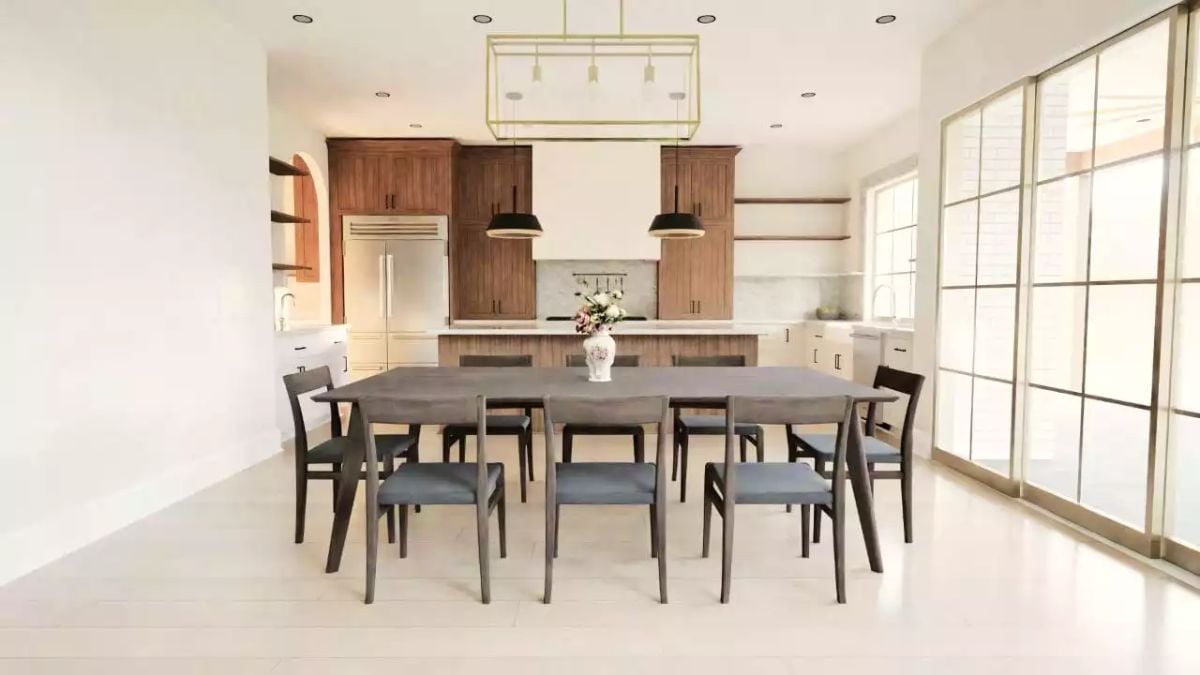 Gold Frame, Black Pendants, and a Dining Table That Seats Eight Without Crowding the Kitchen