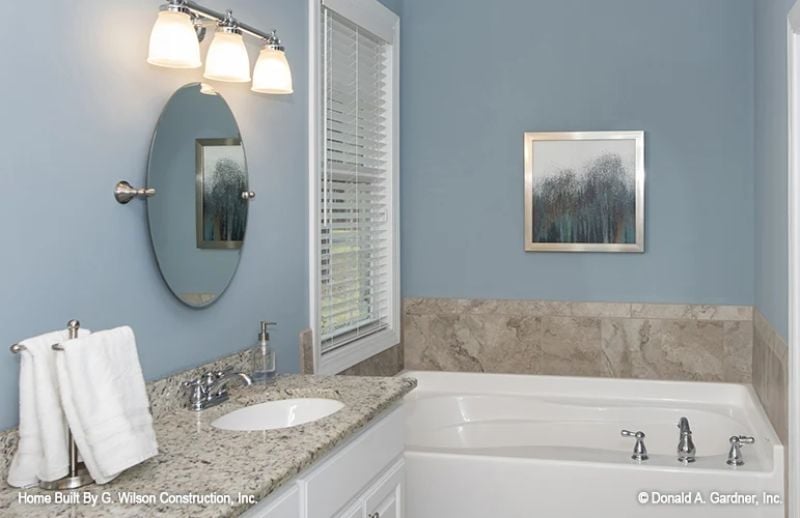 Soaking Tub and Granite Vanity Make the Master Bath Feel Like a Weekend
