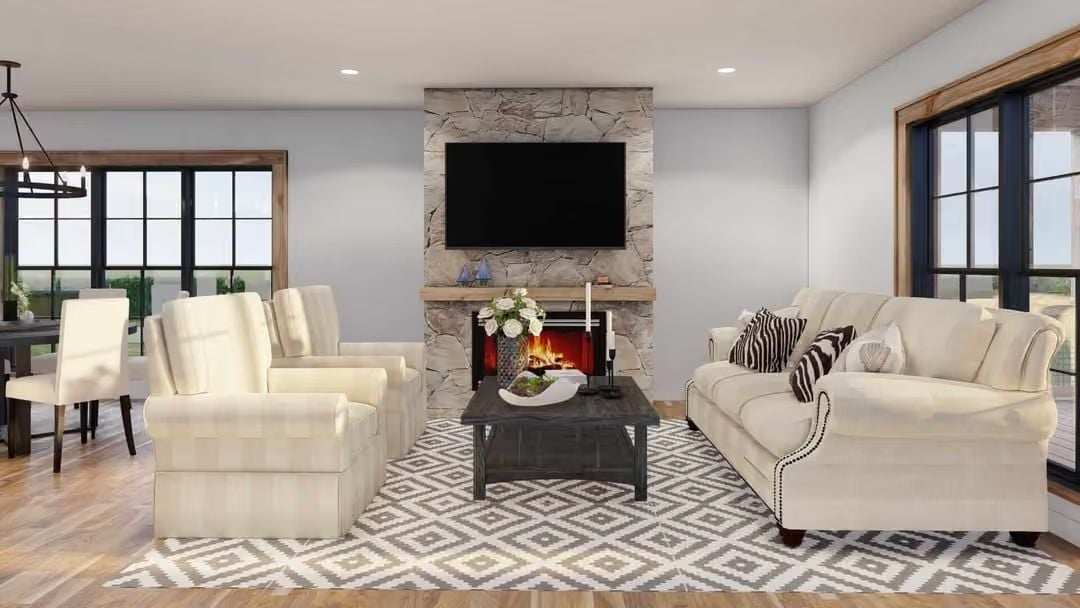 Stone Fireplace, Zebra Pillows, and a Rug That Ties It All Together