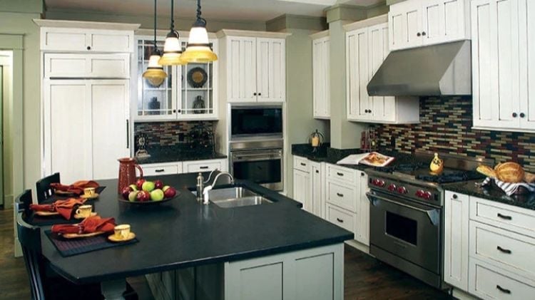 Dark Counters, White Cabinets, and a Kitchen Island That's Doing Real Work