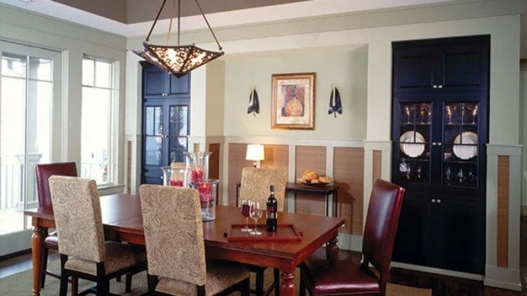 Navy Cabinetry, Leather Chairs, and a Light Fixture That Earns Its Keep