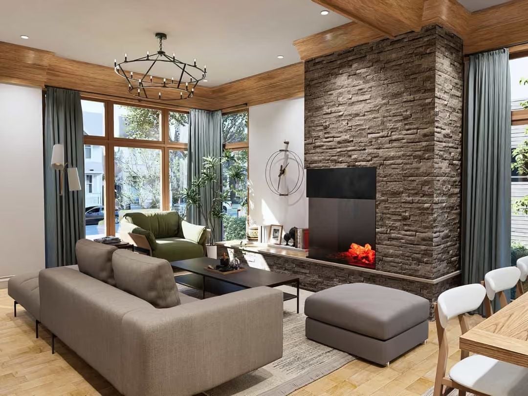 Stone Fireplace Wall Anchors a Living Room Built Around Natural Materials