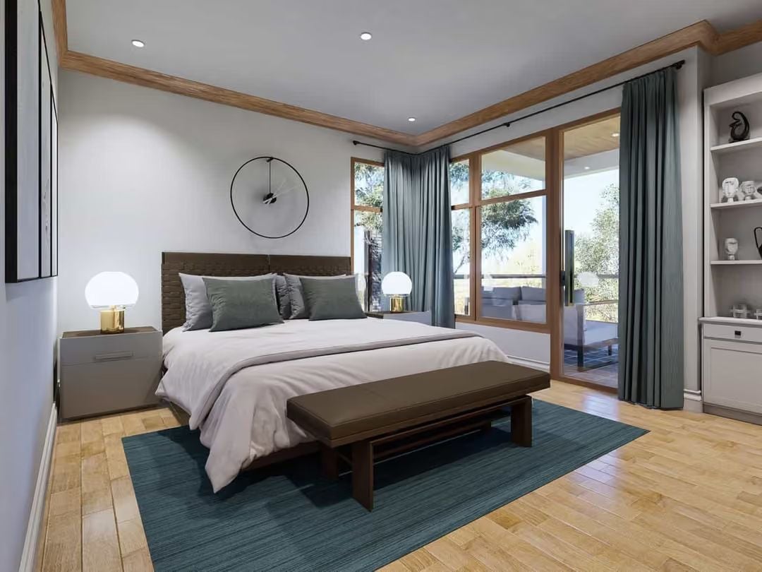 Teal Rug and Wood-Framed Glass Doors Pull This Bedroom Toward the Outdoors