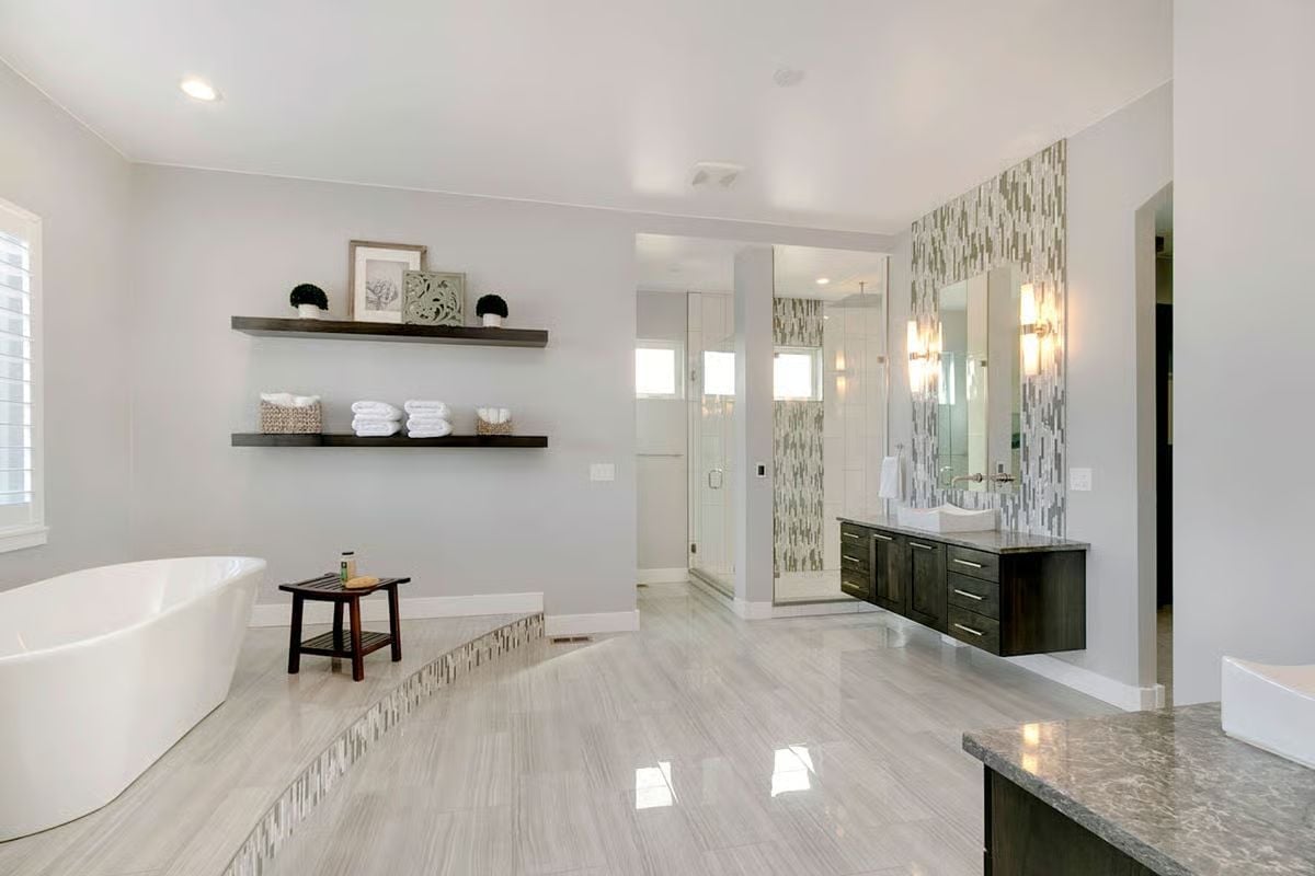 Floating Vanity, Freestanding Tub, and Mosaic Tile That Pulls It Together