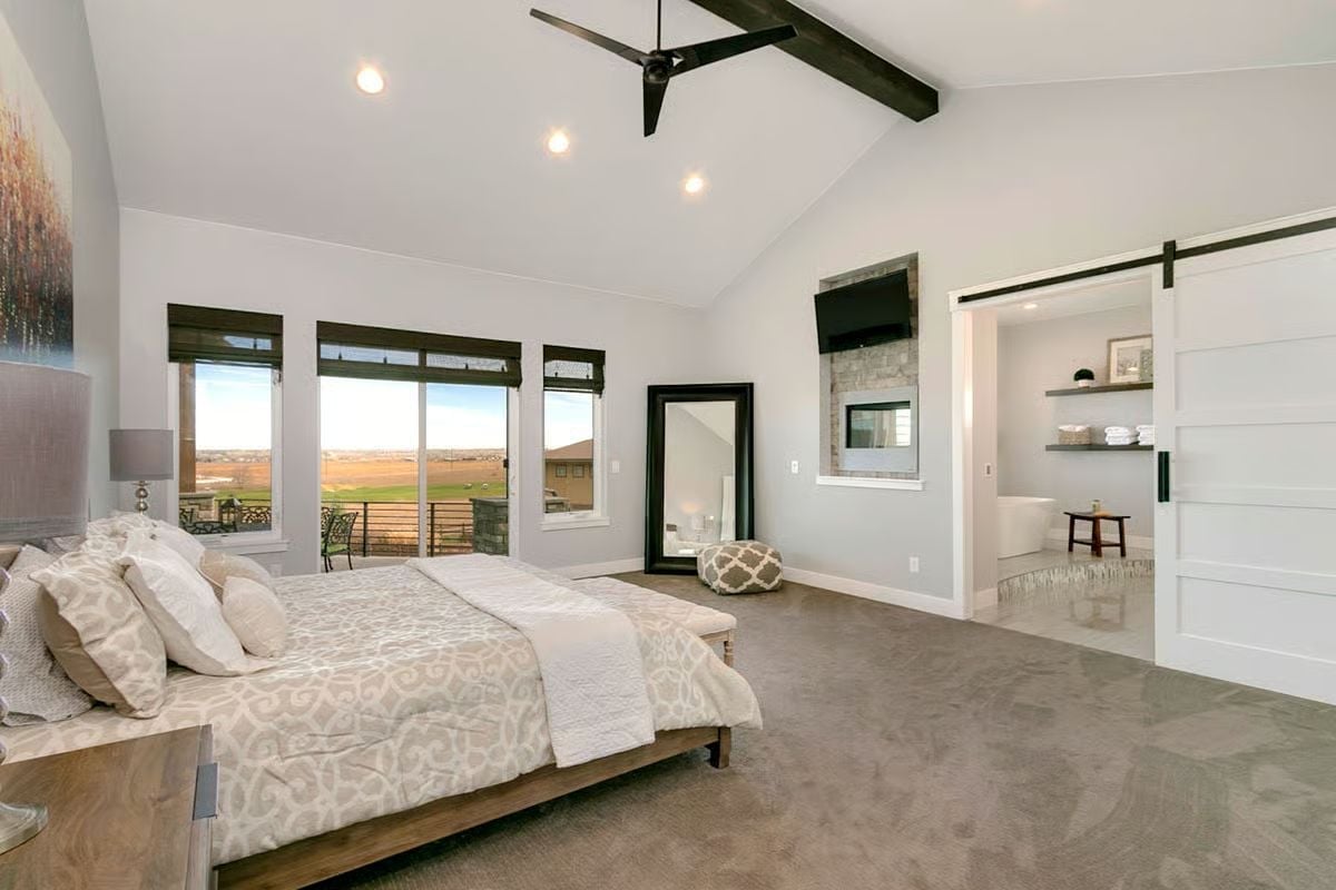 Vaulted Ceilings, Exposed Beams, and a Barn Door Leading Somewhere Worth Going