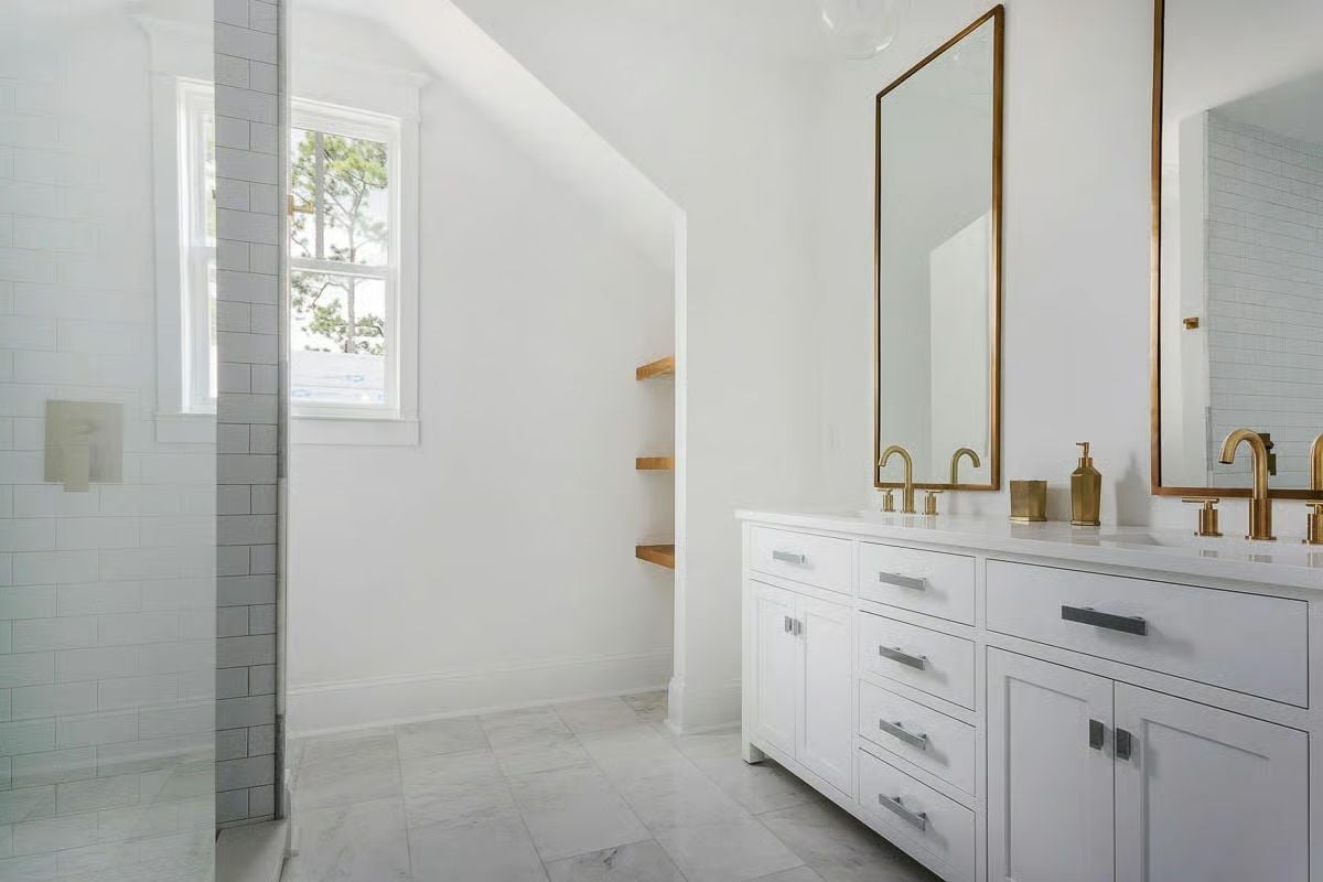Brass Fixtures and White Cabinetry Make a Case for Restraint Done Right
