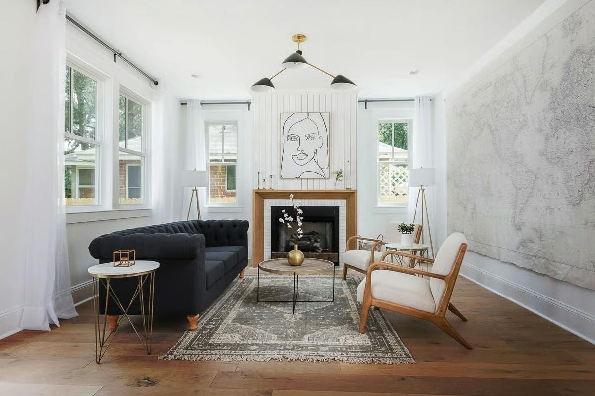 Chesterfield Sofa, Line Art, and a Map Wall Walk Into a Living Room
