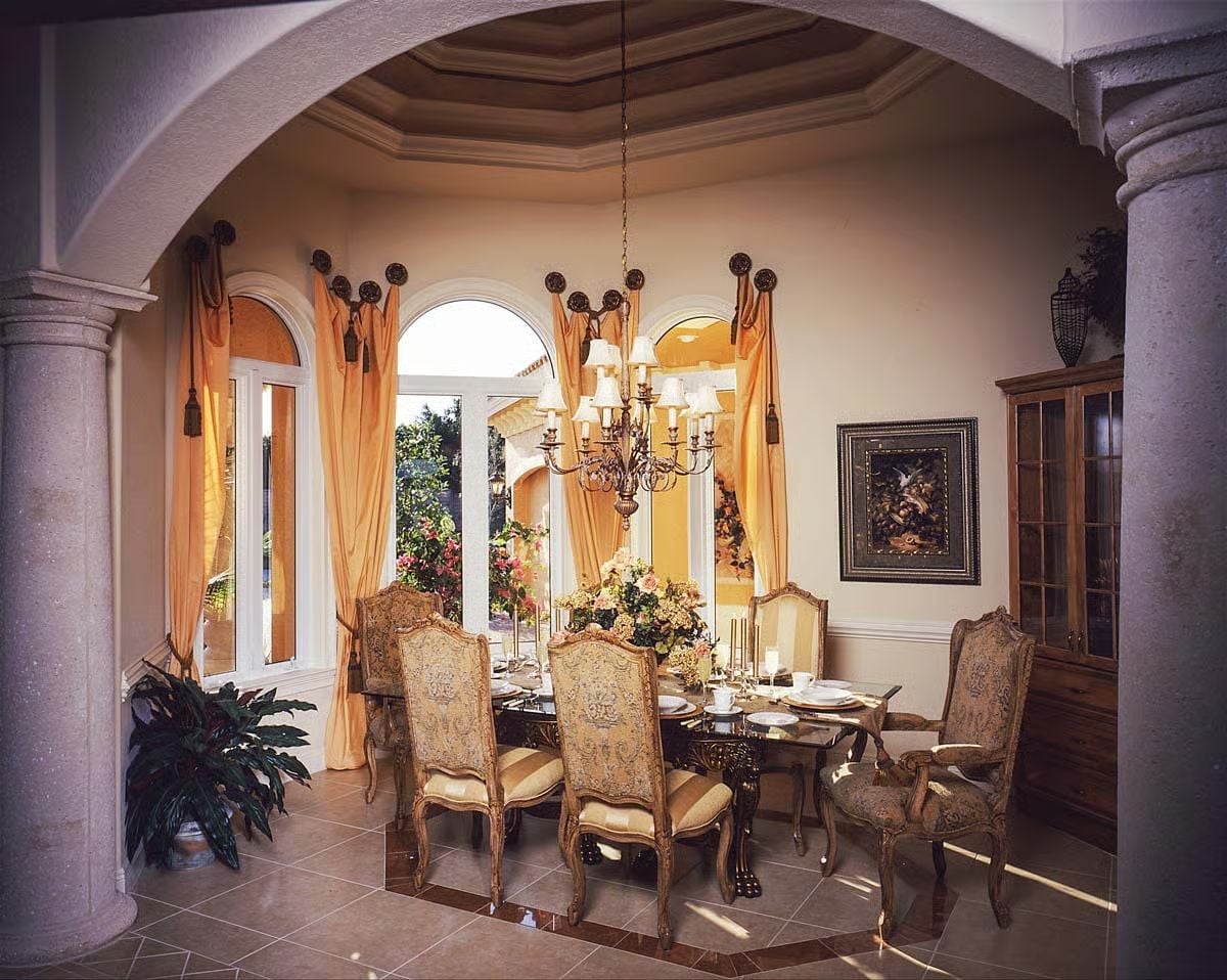 Gold Silk Drapes and a Chandelier That Means Business