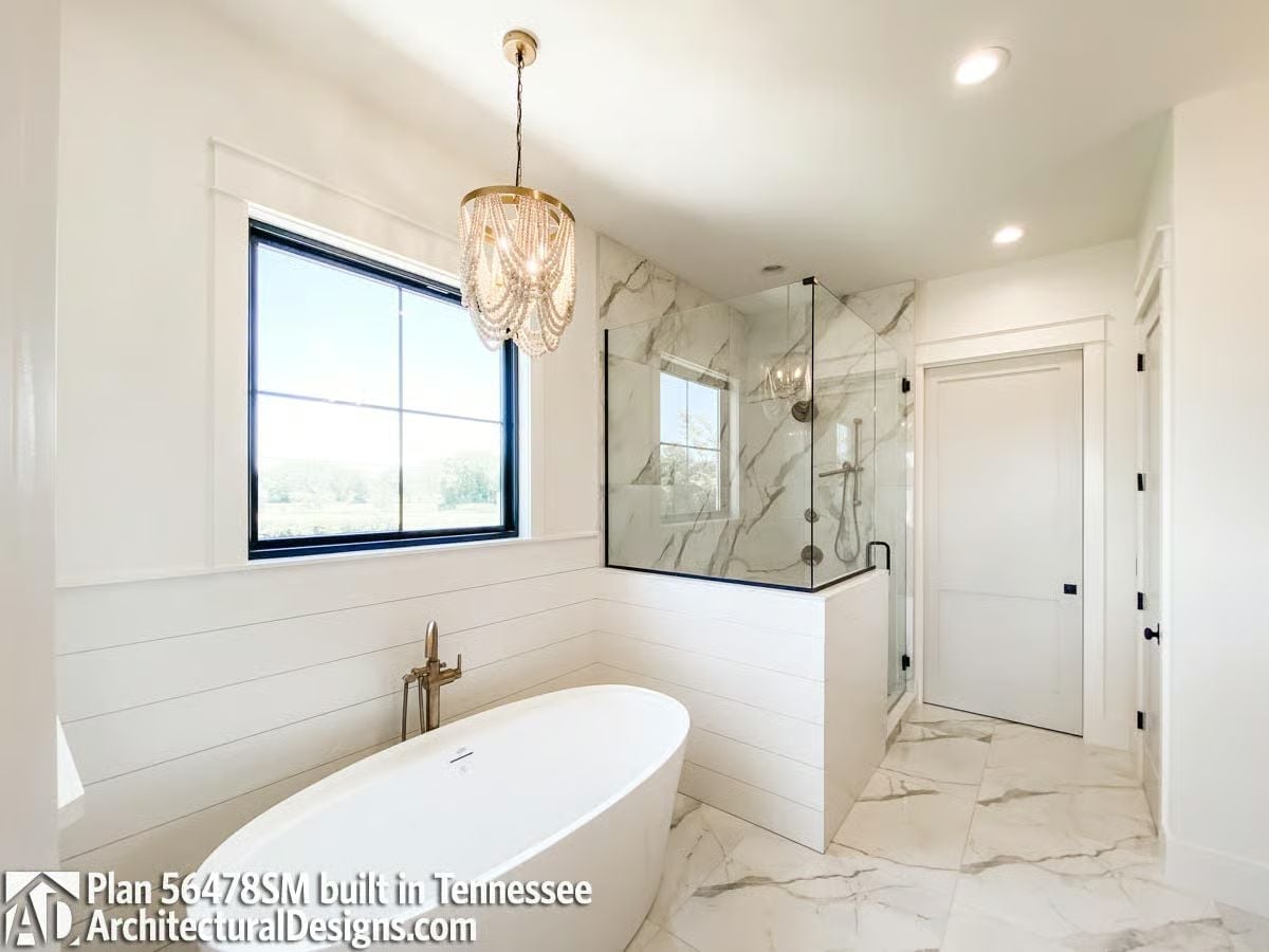 Crystal Chandelier Over a Soaking Tub with a View Worth Lingering Over