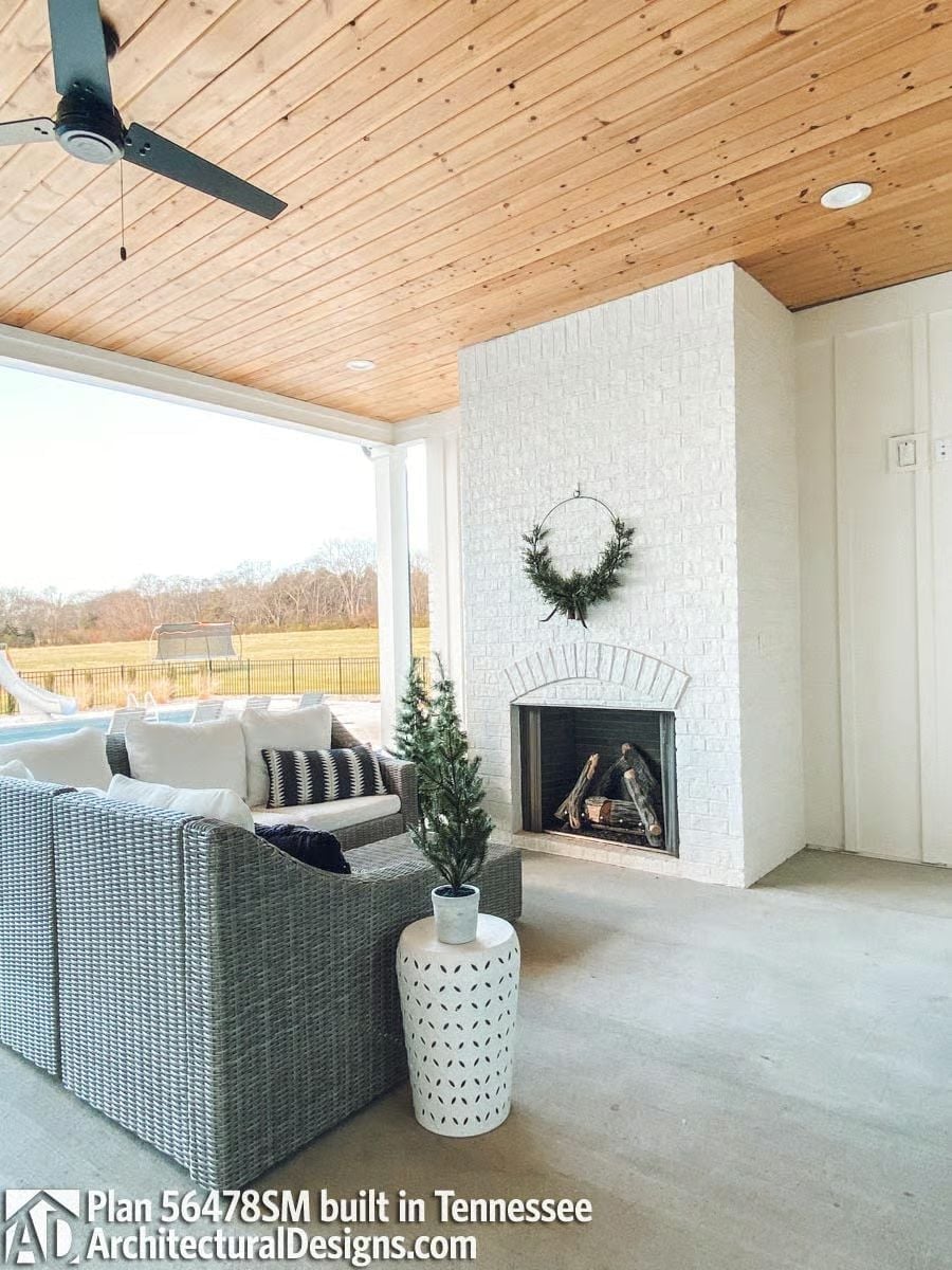 Painted Brick, Wicker Furniture, and an Outdoor Fireplace Ready for December