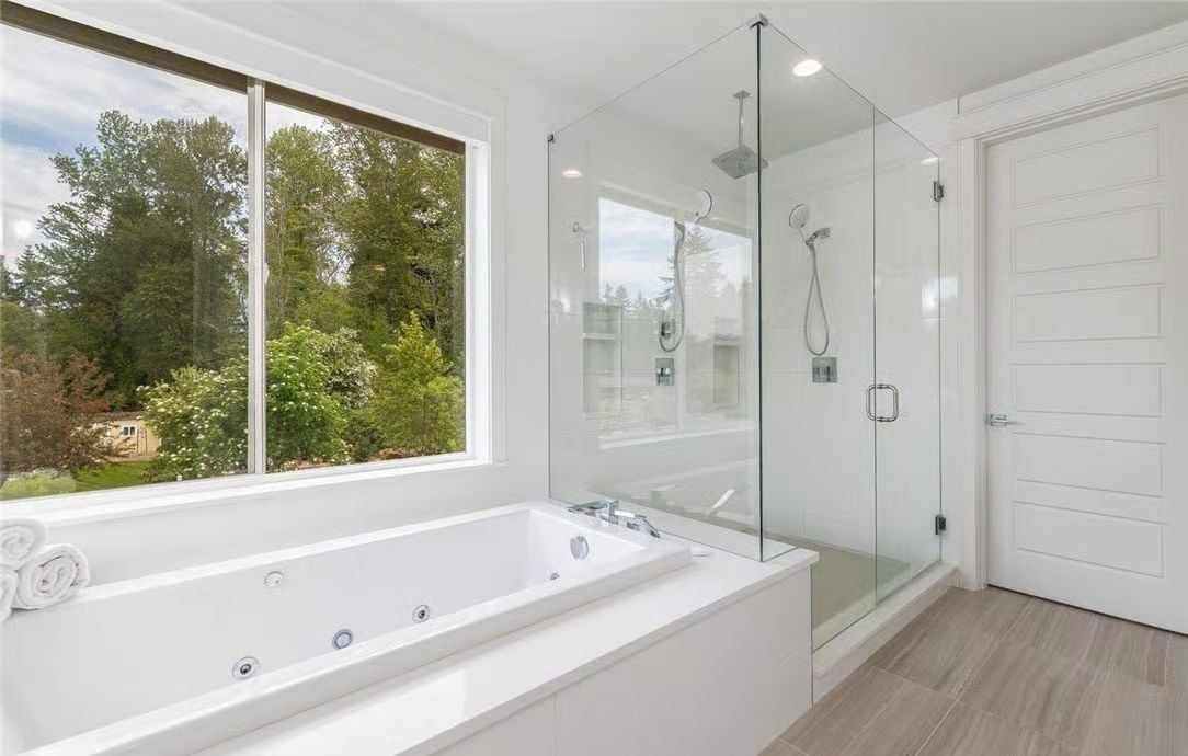 Jetted Tub, Rain Head, and a View Into the Treeline You Won't Want to Cover