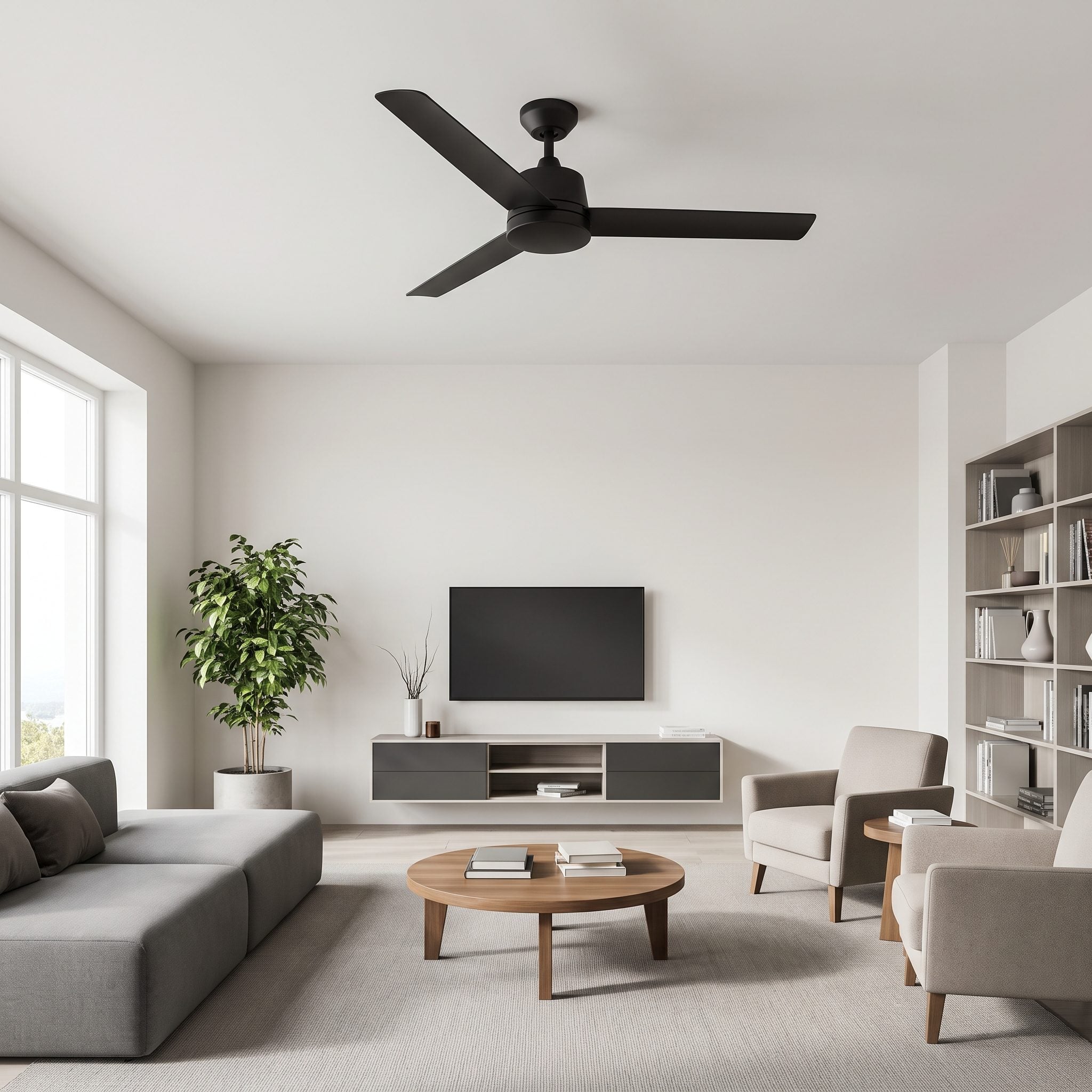Living room with a matte black five-blade ceiling fan mounted against a white nine-foot ceiling above a gray sofa.