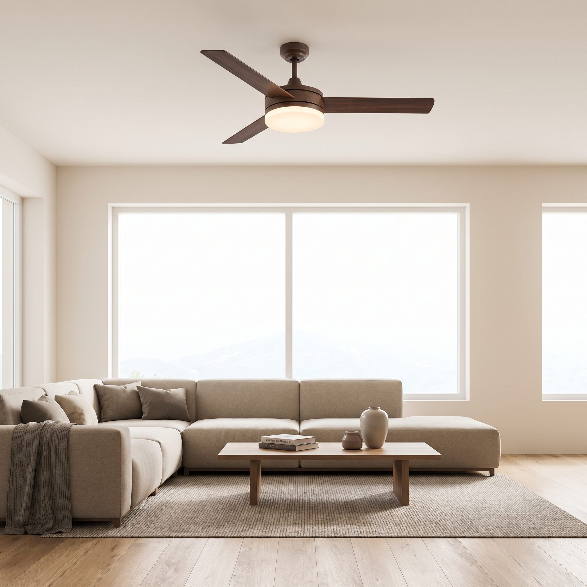 Bedroom with a black five-blade ceiling fan whose LED light ring is set flush into the underside of the motor housing with