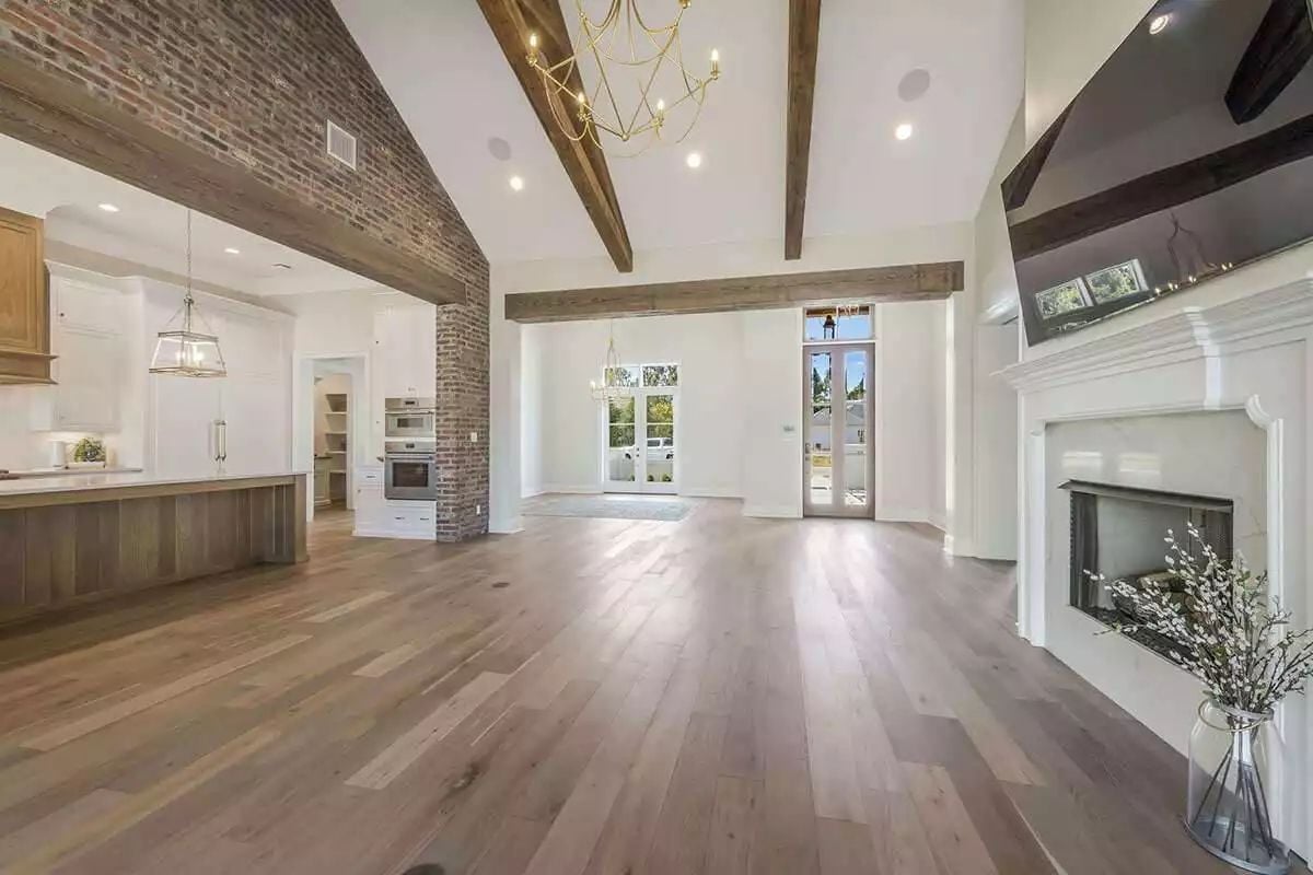 Reclaimed Beams Over Wide-Open Floor That Earns Every Square Foot
