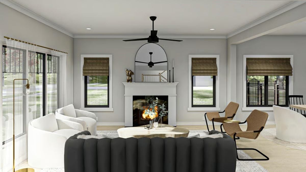Black Sofa, White Curves, and a Fireplace That Actually Gets Used