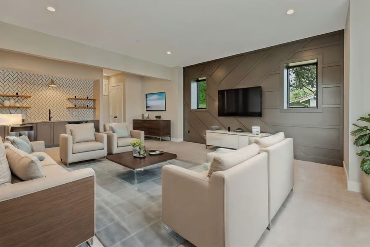 Geometric Wall Paneling in Taupe and a Wet Bar Nobody Saw Coming