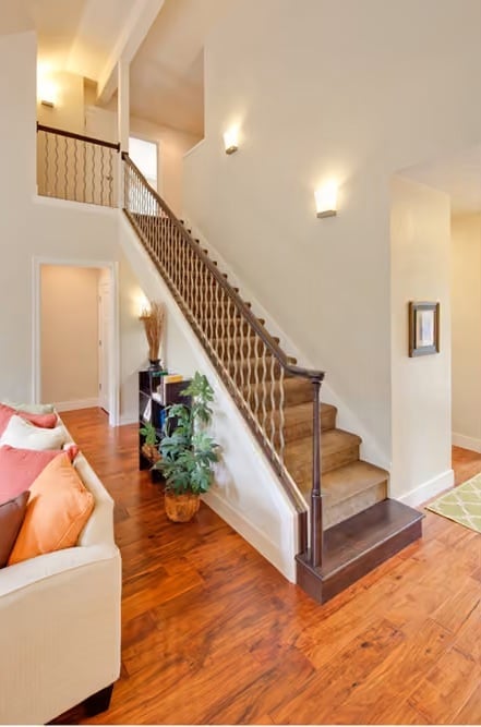 Hardwood Floors and a Curved Staircase That Earns Its Place in the Foyer