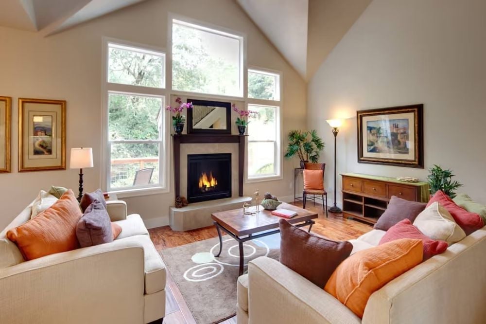 Vaulted Ceilings and a Live Fireplace Pull This Living Room Together