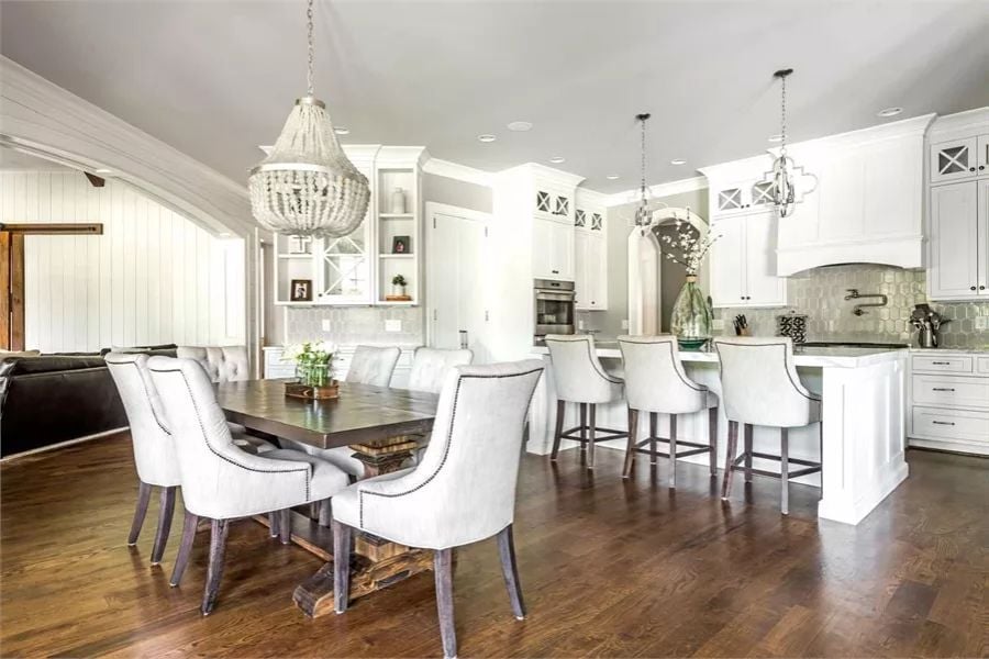 Beaded Chandelier, Nailhead Chairs, and a Kitchen Island That Pulls Double Duty