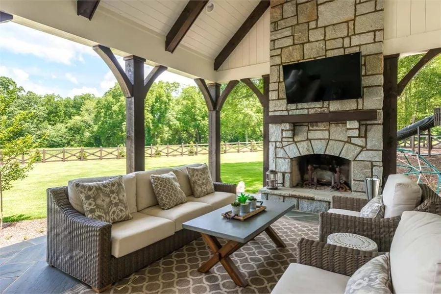 Covered Patio Fireplace Built for the Crowd That Never Wants to Go Inside