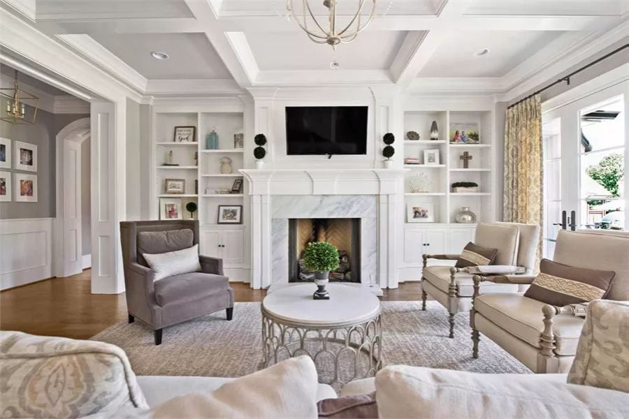 Marble Surround, Coffered Ceiling, and Seating for Six Before the Sofa Even Counts