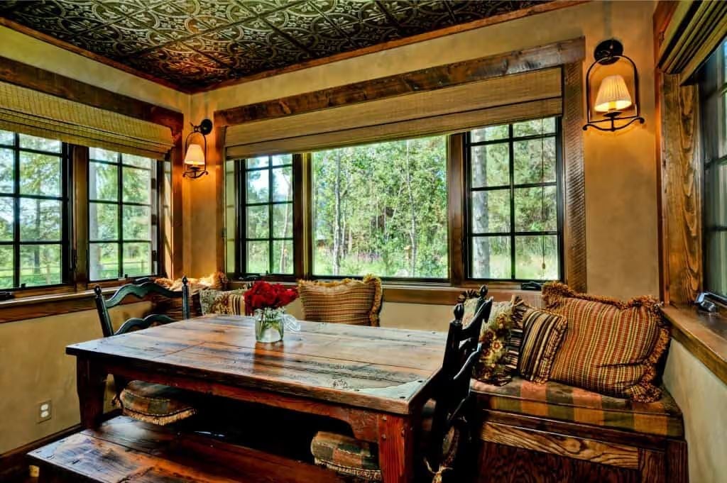 Pressed Tin Ceiling and Reclaimed Wood Table Earn Every Inch of This Nook