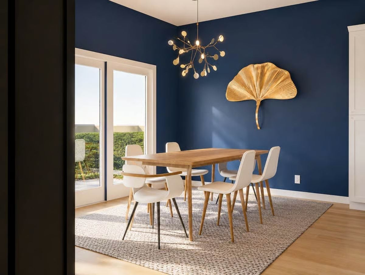 Gold Leaf Wall Sculpture Pulls Navy and Oak Into the Same Conversation
