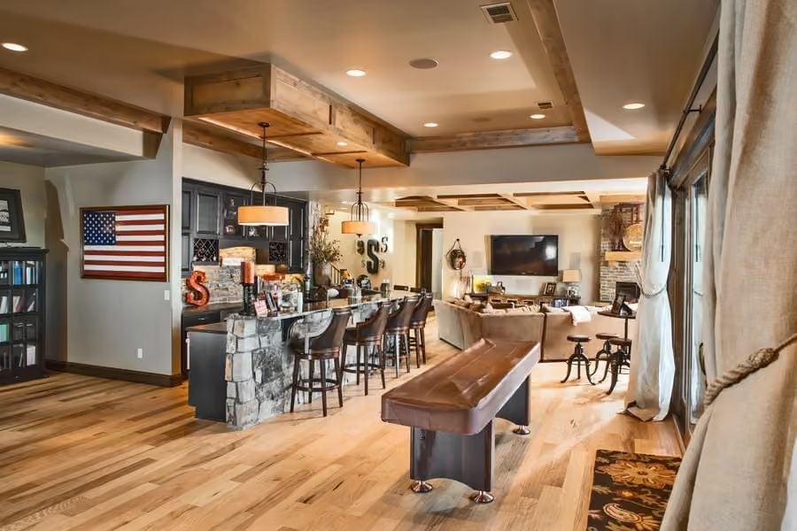 Stone Bar Base and Shuffleboard Table Sharing a Room Without Apologizing