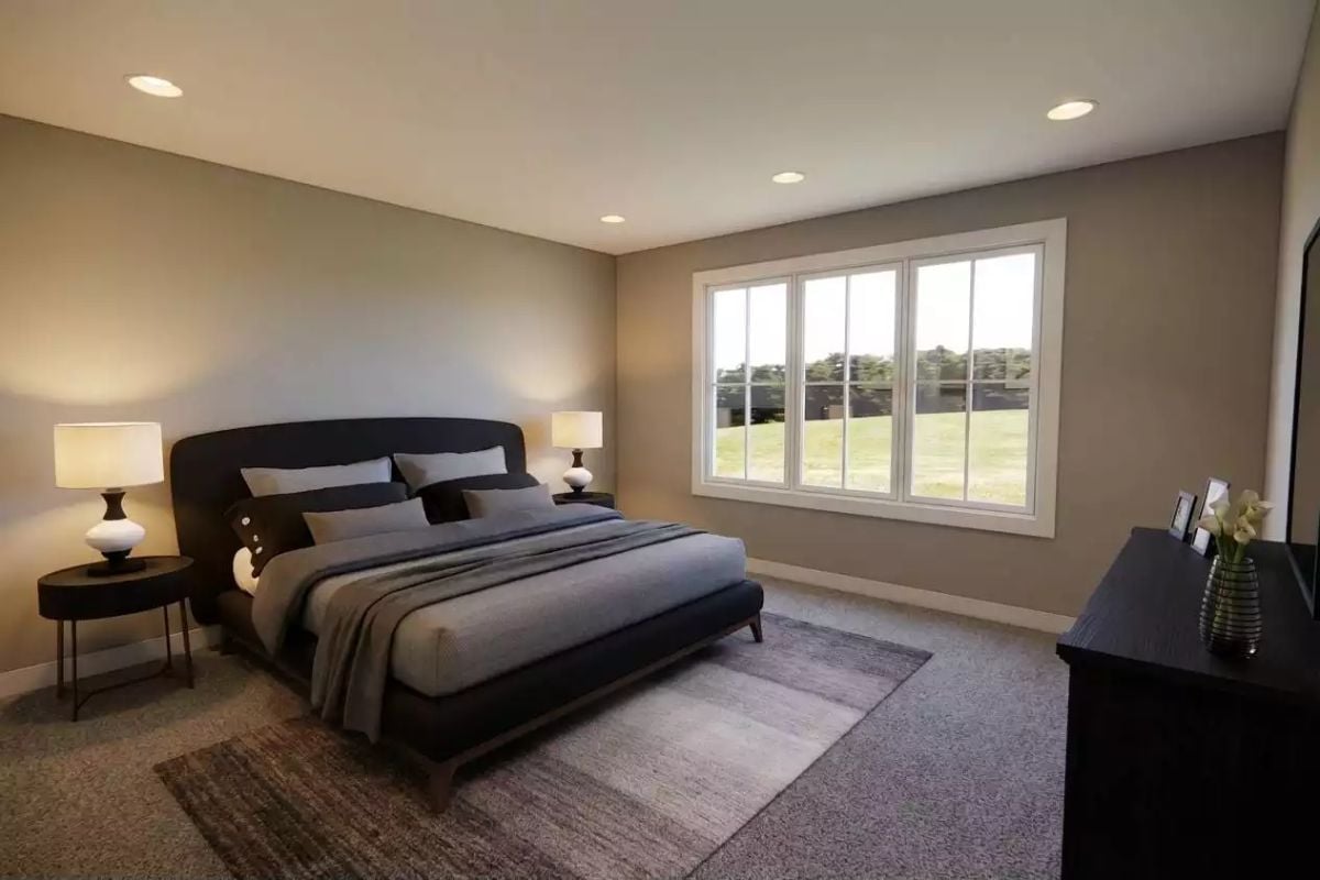 Warm Greige Walls and a Low-Profile Bed That Gets the Scale Right